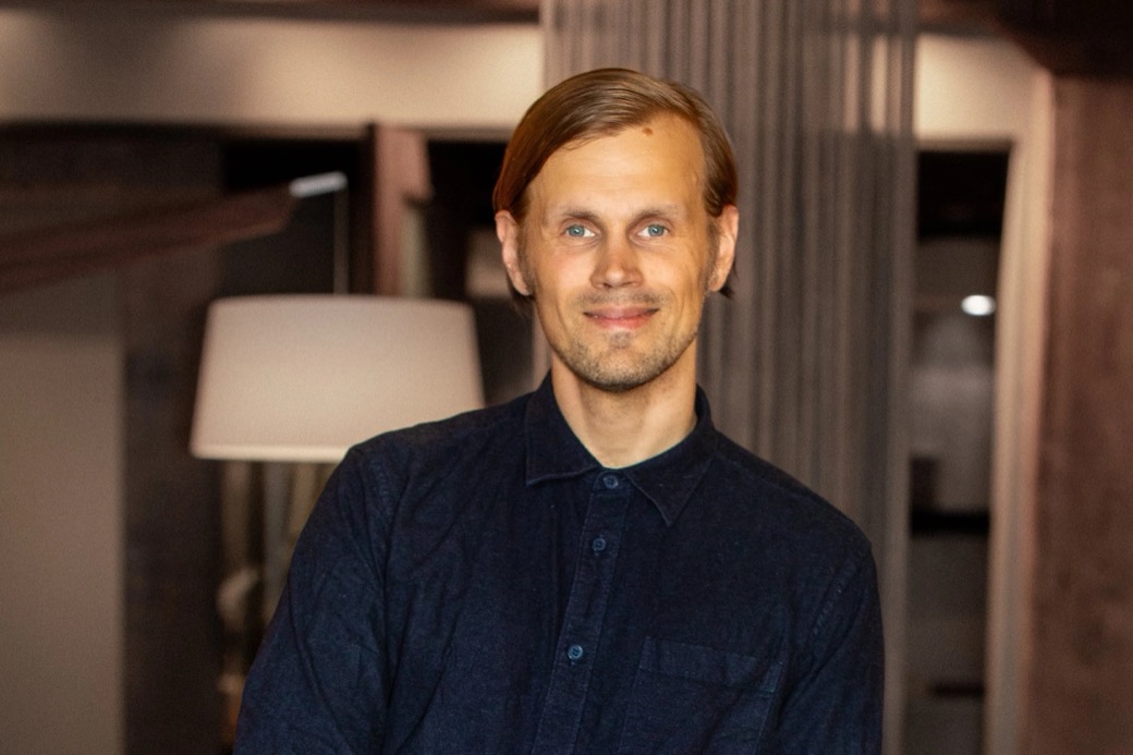 Tommi Forsstrom in a hotel lounge